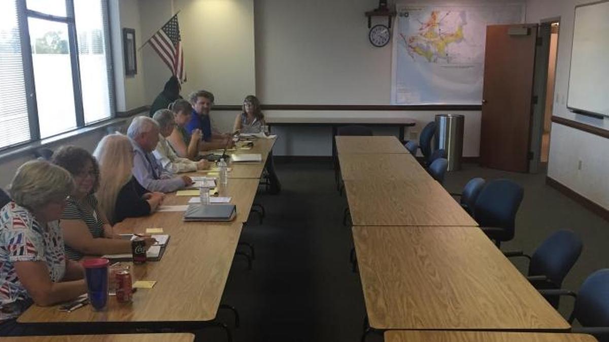 Representatives for the Manatee Education Association wait Tuesday for School District of Manatee County representatives to arrive at district offices on Tuesday before beginning negotiations over the 2017-18 teacher contract.