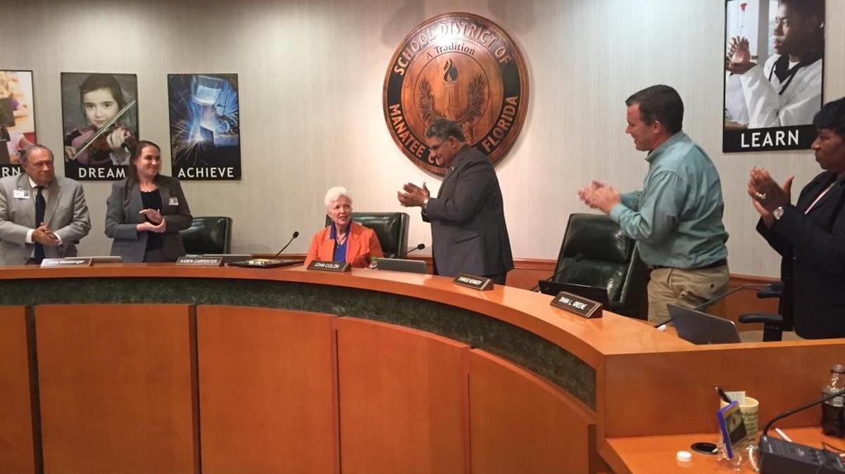 Karen Carpenter (seated) recently vacated her spot on the Manatee County School Board.
