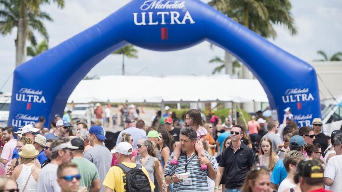 Festival-goers enter the My Hometown Festival on Saturday afternoon at Nathan Benderson Park in Sarasota. The festival offers a selection of craft beer, local food and live music.