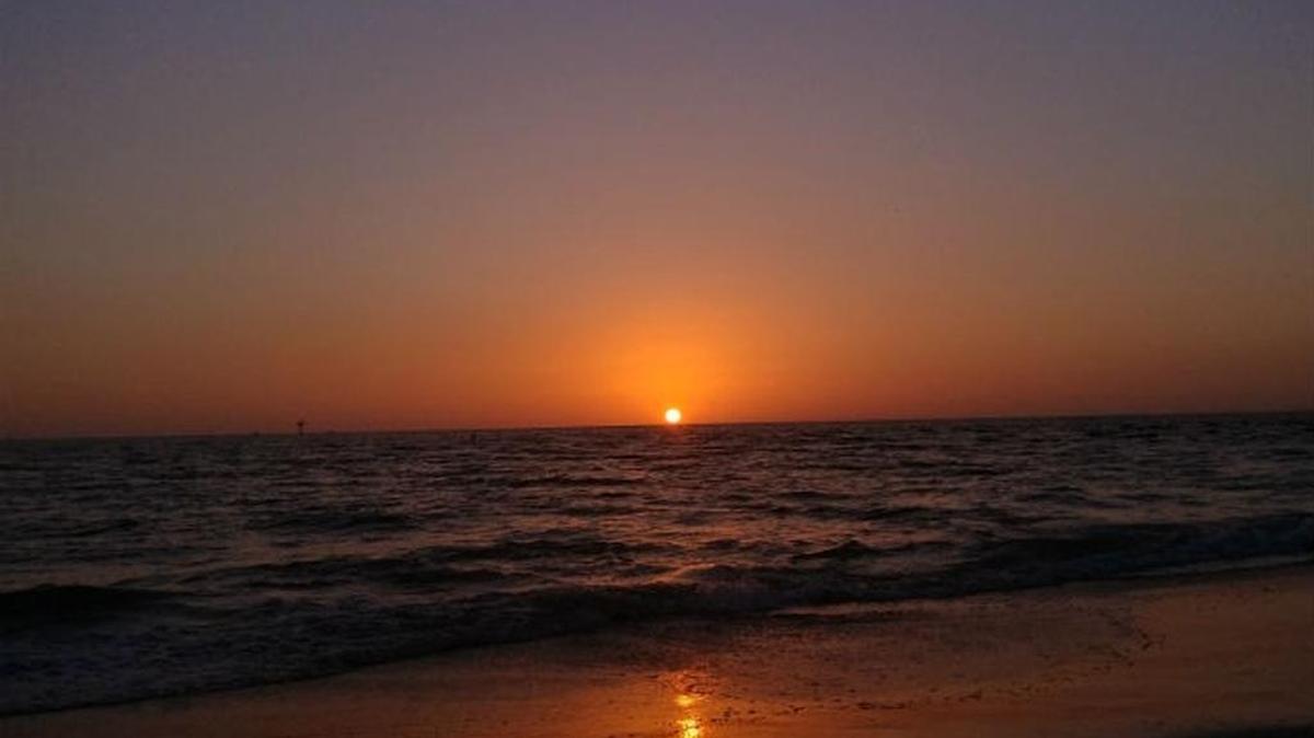 A sunset in Treasure Island on Sunday.