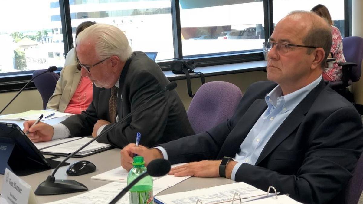 Manatee County Administrator Ed Hunzeker, left, and Longboat Key Town Manager Tom Harmer participate in a joint meeting between the two municipalities on Tuesday.