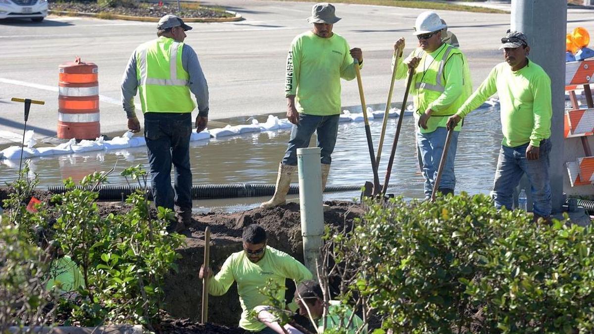 An overnight sewer main break sent wastewater pouring into the intersection of Cortez Road and 66th Street on Dec. 11. Crews continue to work on fixing the problem.