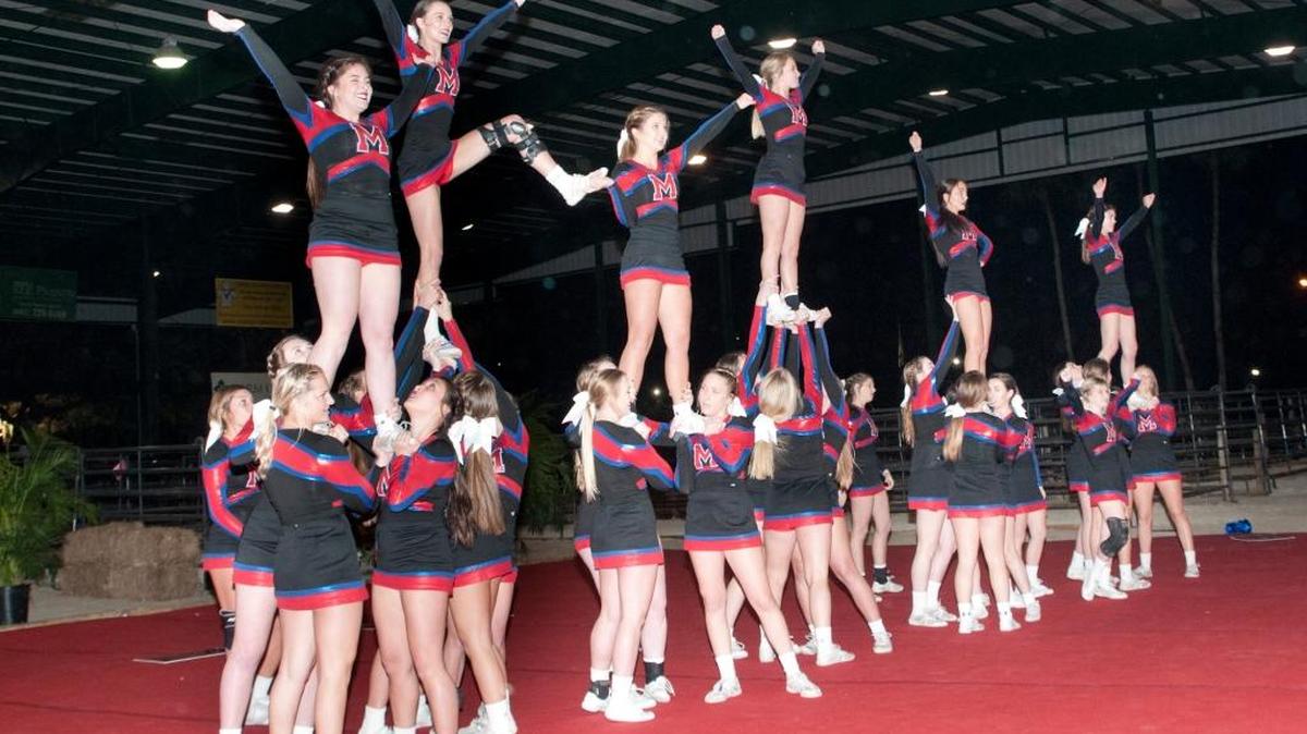 Manatee High School’s varsity cheerleaders, shown above during Monday's competition, won the 23rd annual Manatee County Fair Varsity Cheerleading Competition Monday at the county fairgrounds in Palmetto.