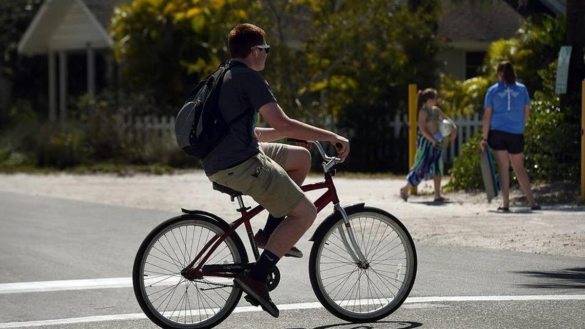 A young cyclist pedals down Gulf Drive on the north end of Anna Maria Island Read more here: http://www.bradenton.com/news/local/article68160152.html#storylink=cpy