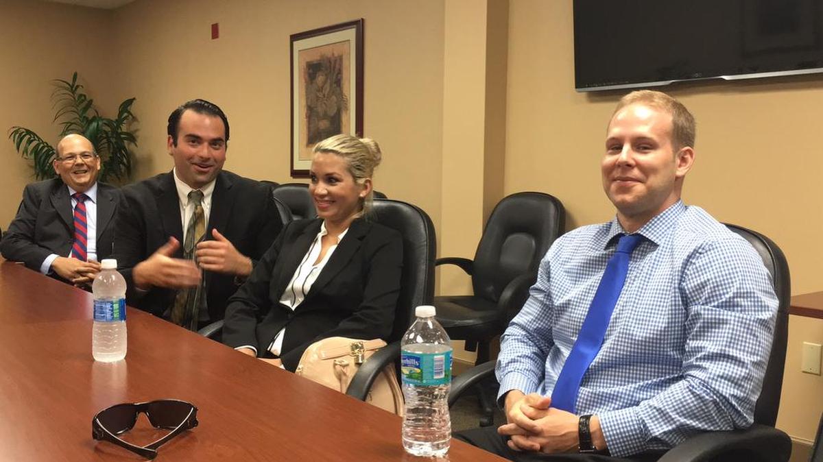 Dr. Nemer Dabarge, far left, co-organizer with Kim Sorrells of the new internal medicine residency program at Blake Medical Center, listens to three of the 15 new residents who start July 1 including, from left after Dabarge, Ian Kahane, Daniela Rodrigues and Mark Baker.
