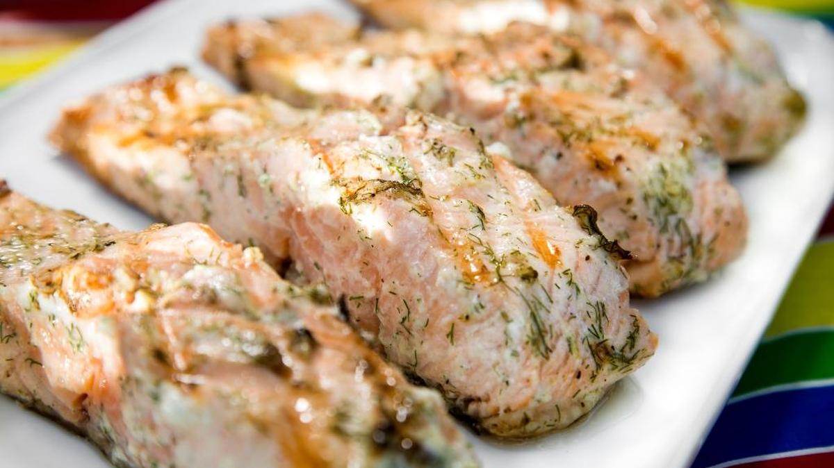 Grilled salmon on the table, accompanied by grilled avocado halves, would provide a good source of omega-3 fatty acids.