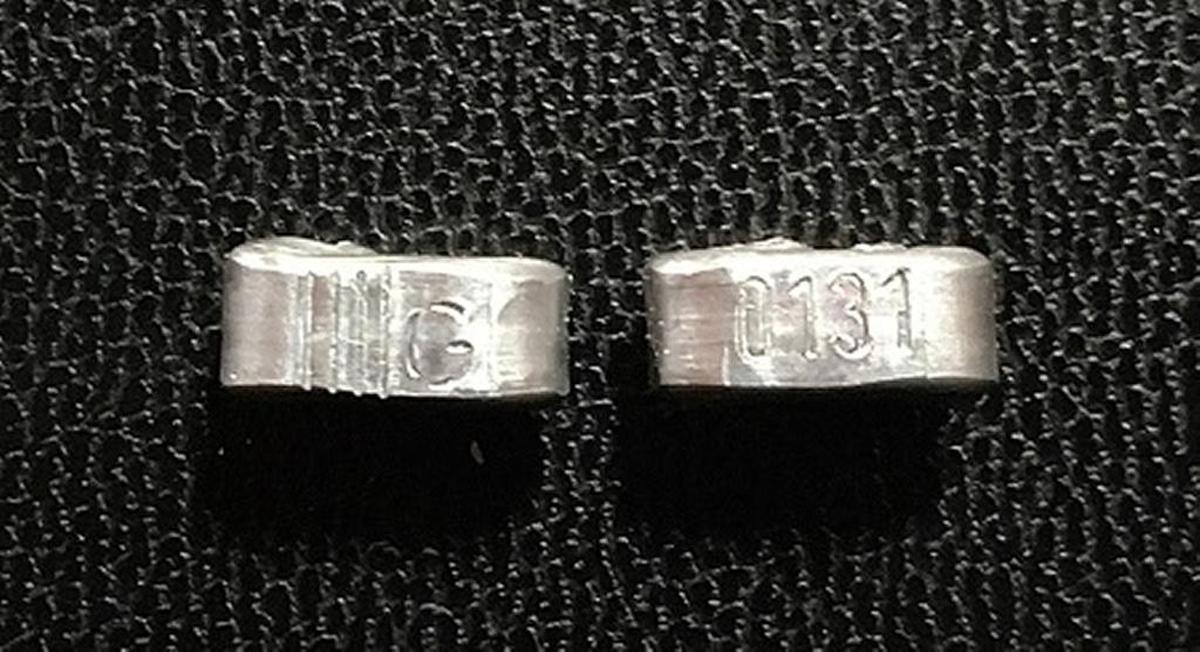 The metal ties on which consumers can find the lot numbers to see if their chub has been recalled.