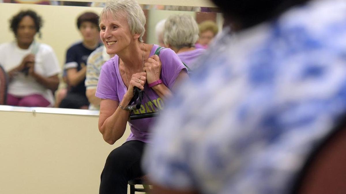 Teacher Paula Edwards leads seniors as they participate in a silver sneakers class at Renaissance on 9th in Bradenton. Other classes, like tai chi and yoga are geared towards the needs of seniors.