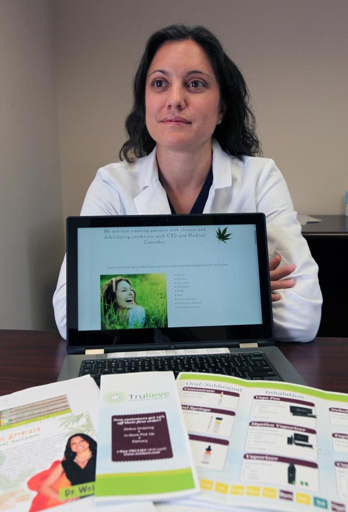 Dr. Michelle Weiner of Spine and Wellness Centers of America says the state has been woefully slow in issuing identification cards for medical-marijuana patients.