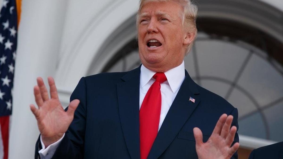 President Donald Trump speaks to reporters Thursday before a security briefing at Trump National Golf Club in Bedminster, N.J.