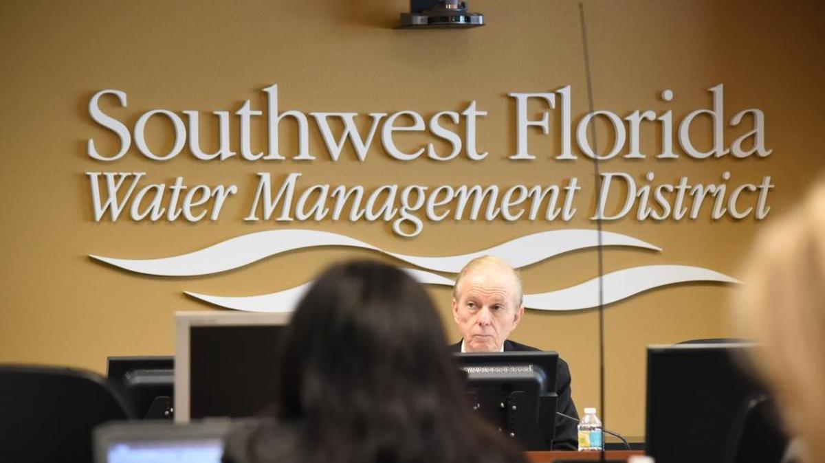 Administrative law judge D.R. Alexander listens to testimony during the second day of the Long Bar Pointe Mitigation Bank permit hearing Wednesday.