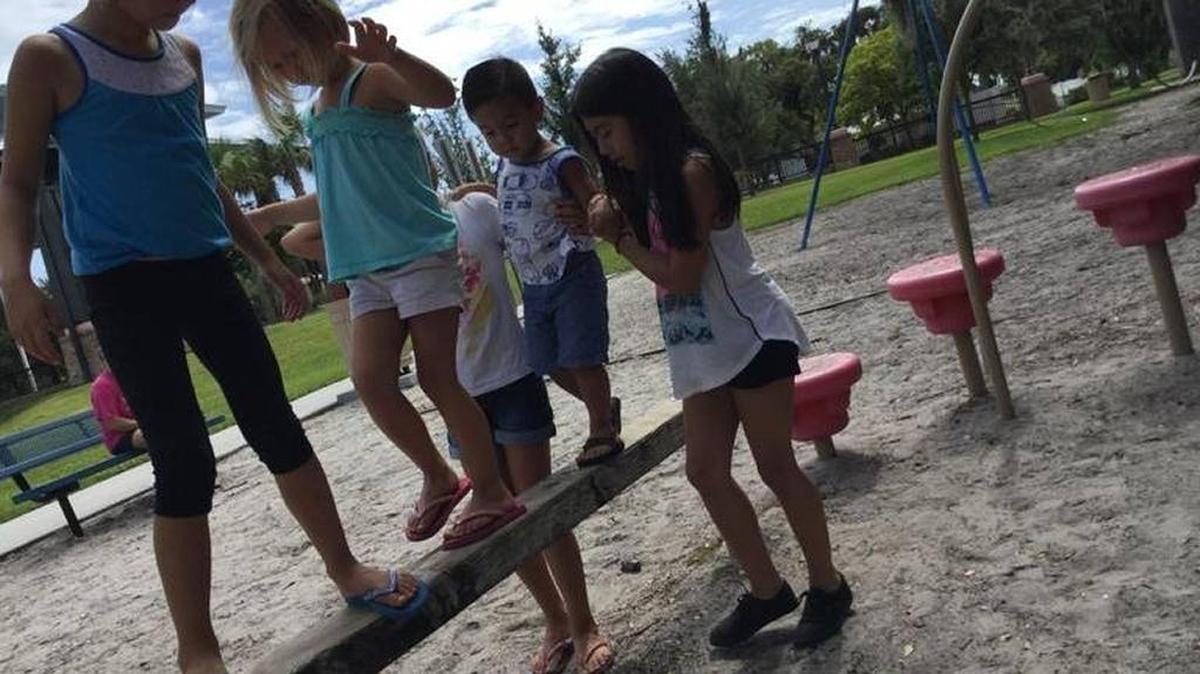 Children play in Palmetto’s Sutton Park as the city looks to strengthen park rules to prevent unwanted activities such as homeless camping and loitering.
