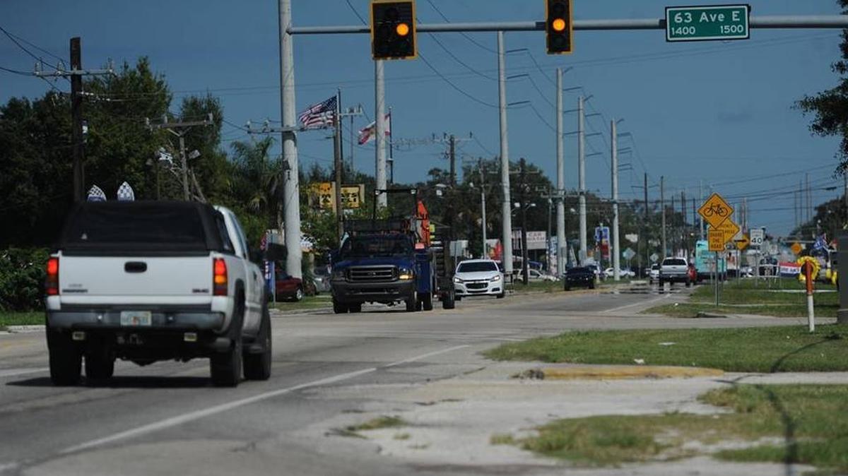 Traffic travels along 15th Street East looking north toward 63rd Avenue East. The Florida Department of Transportation has received approval from the Federal Highway Administration to move forward with multimodal improvements to the worn two-lane road.