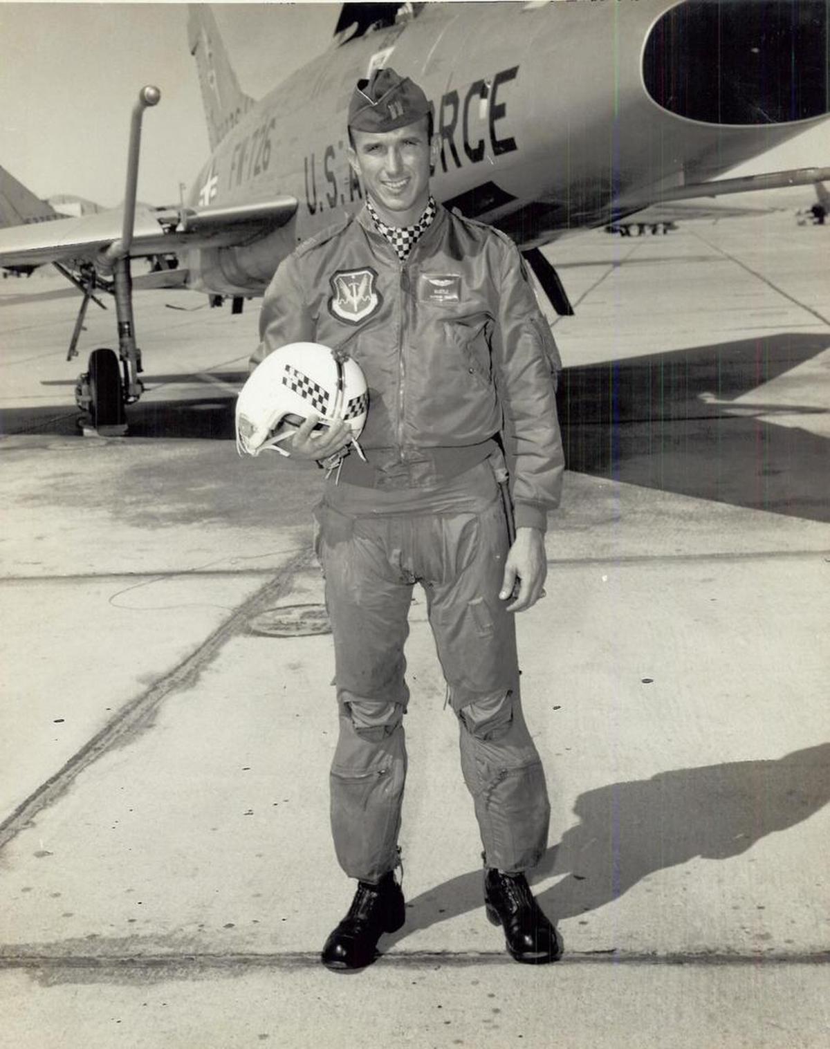 Larry Bustle, then a captain is shown prior to his Vietnam service with an F-100 fighter at Nellis Air Force Base, Nevada.