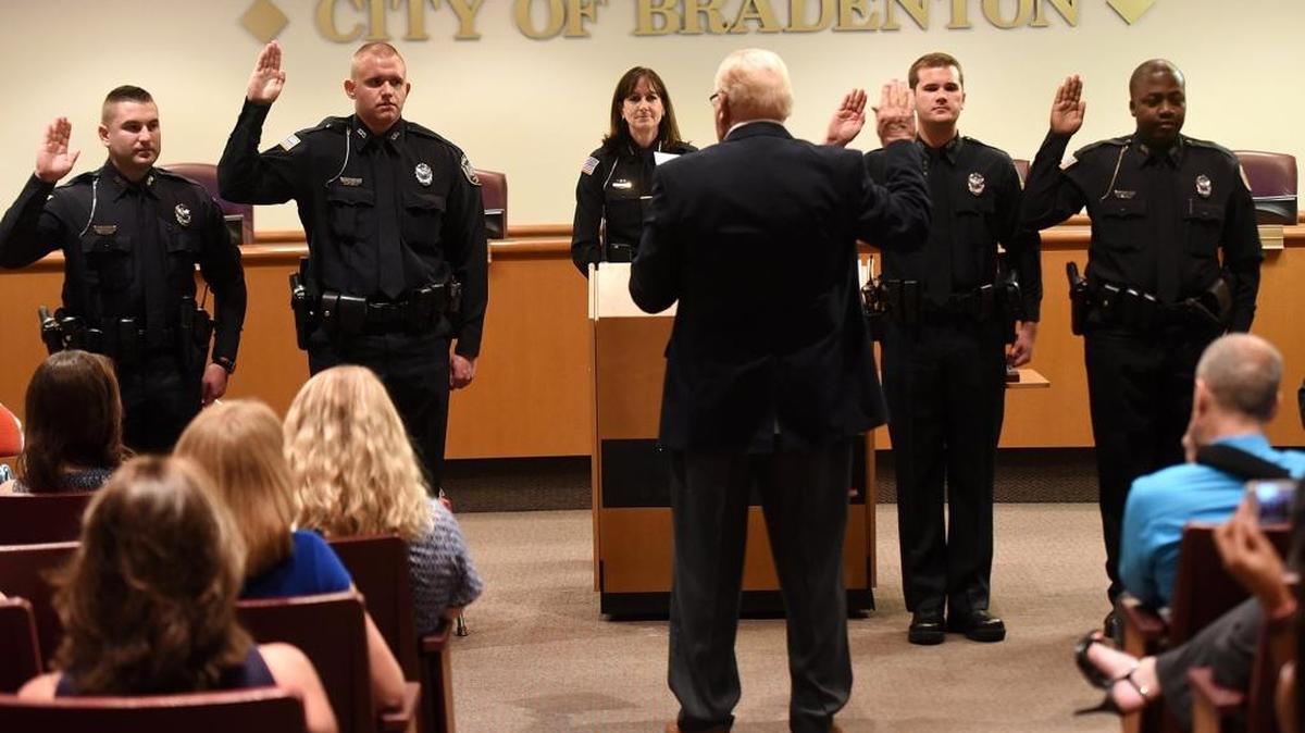 The Bradenton Police Department will hosted an oath of office ceremony in the City Hall Council Chambers for new police officers. From left Alex Wentland, Brian Sands, Chief Melanie Bevan, Mayor Wayne Poston, Brian Hall and Donald Davis, Jr.