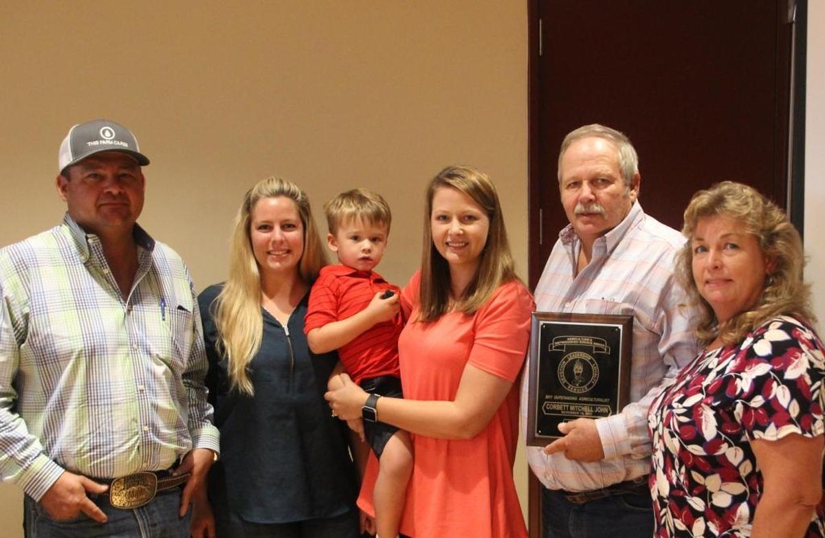 Outstanding Agriculturist Mitchell John was joined by his family on Tuesday. Shown above are, from left, Steve John, Maria Mathews, Conner Dorman, Tiffany Dorman, Mitchell John and Teresa John.