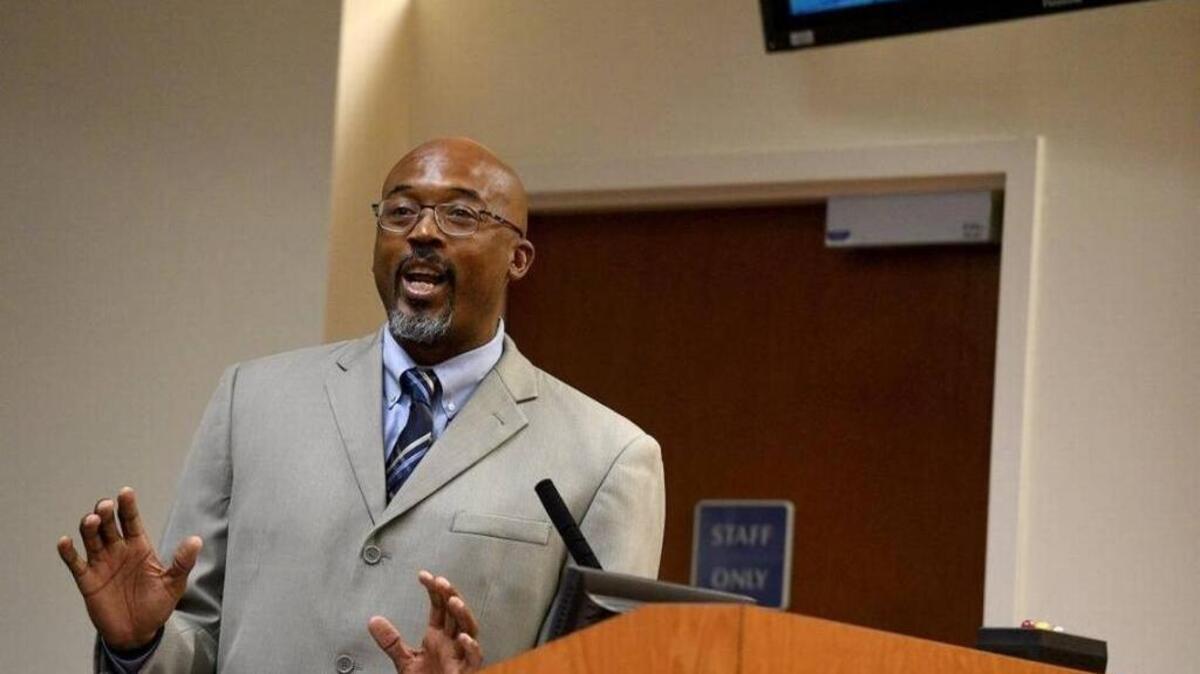 Palmetto Youth Center Director Reggie Bellamy appears before the Manatee County Commission on Feb. 23 to clear his name and that of the youth center after County Commissioner Charles Smith demanded his resignation in January. Over the course of almost three months, none of Smith’s concerns have been substantiated as the two now prepare to face off politically in the August primaries.