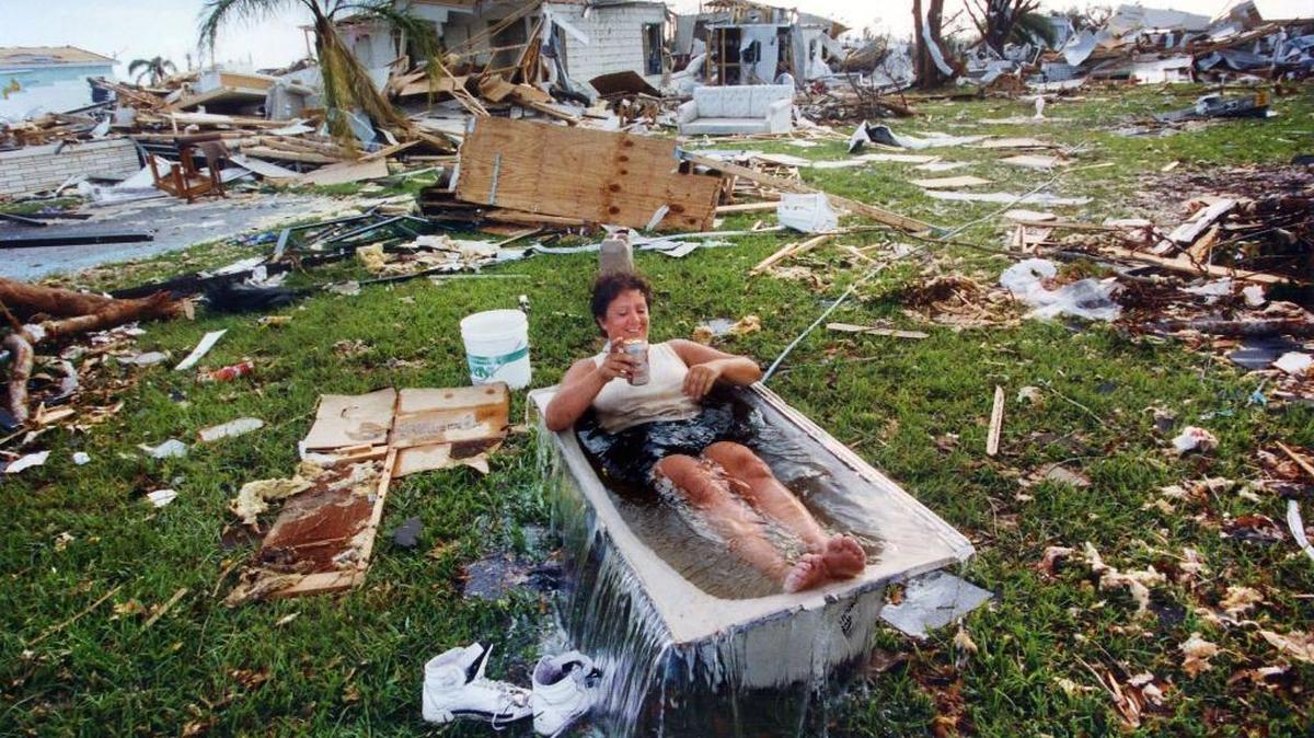 After Hurricane Andrew destroyed her mobile home in Florida City, Marjorie Conklin cooled off in a tub she found nearby.