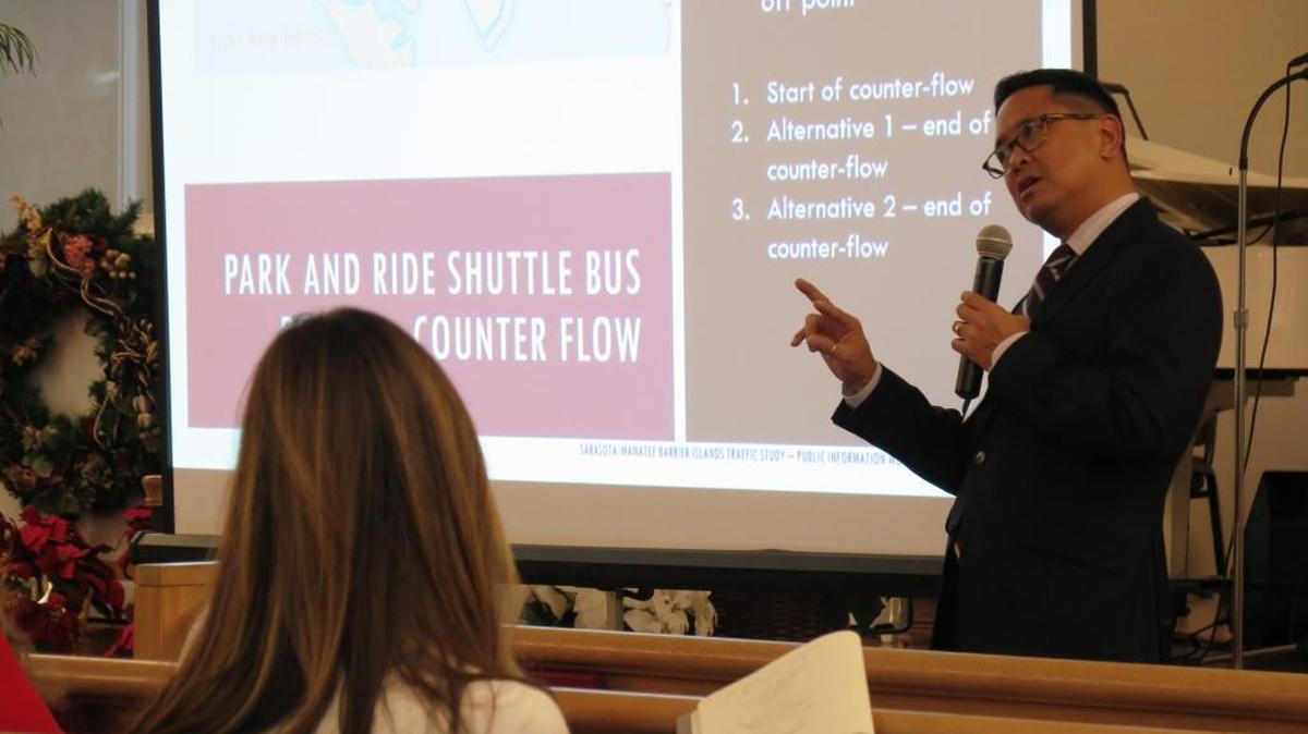 Stantec consulting manager Frank Domingo walks the crowd through the ideas that the Florida Department of Transportation has come up with to improve traffic on the barrier islands at a public information workshop Tuesday in Longboat Key.