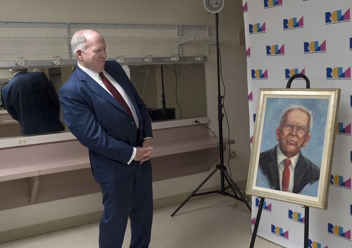 Former CIA chief John Brennan, who has been a frequent critic of Donald Trump, weighed in Monday before a Town Hall Lecture appearance at an Wezel Performing Arts Center, Sarasota. Brennan reacts to a portrait by Ringling senior illustration student, Lauren Dellapa.