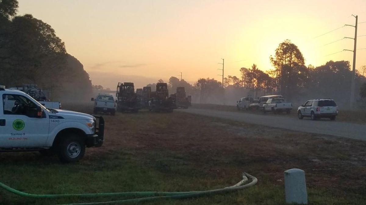 Crews arrived to begin the mop-up phase of the Raintree fire near North Port on May 15.