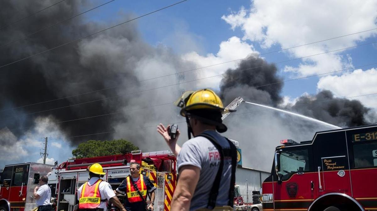 Manatee and Sarasota County firefighters are teaming up with Sarasota Memorial Hospital to address cancer, a leading cause of death among fire rescue teams. Firefighters responded to a large December 2017 blaze in this Bradenton Herald file photo.