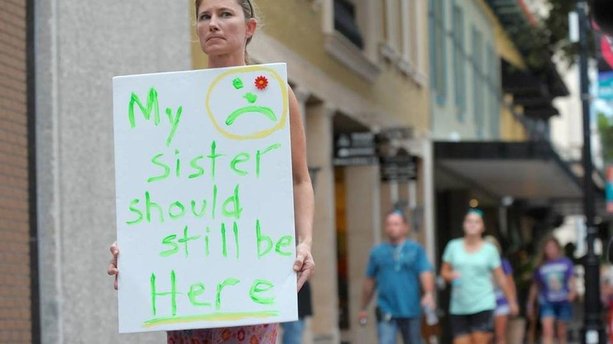 International Overdose Awareness Day march participants walk through downtown Bradenton on Aug. 31, 2015.