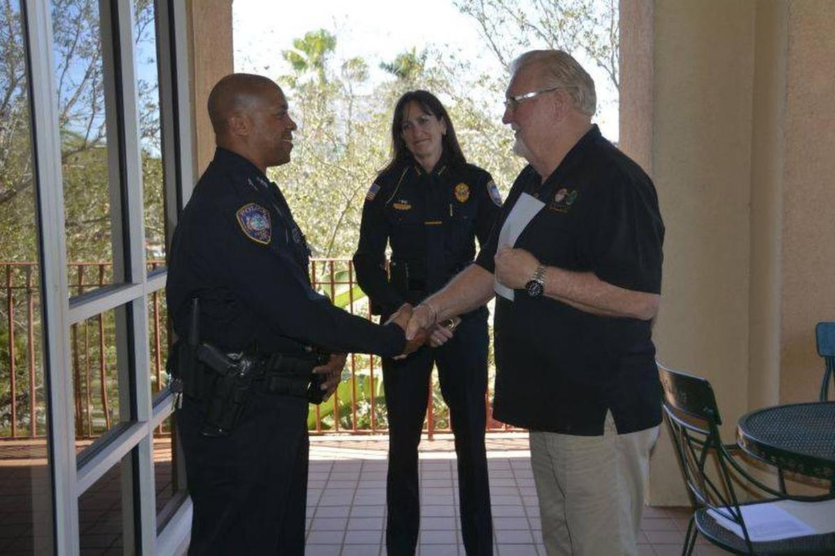 Bradenton Mayor and Police Commissioner Wayne Poston after swearing in the now-former Sgt. Gregory Pryor in 2016 as Chief of Police Melanie Bevan watches.
