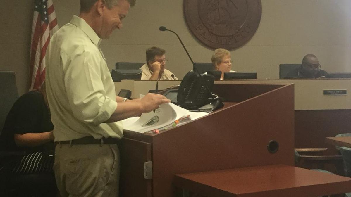 Palmetto city clerk Jim Freeman presents a budget to the city commission on Wednesday that features a $528,000 shortfall and the challenge to balance that deficit before September.