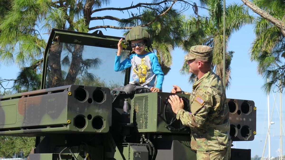 Joshua Krusch, 6, wears a National Guard helmet at the Touch a Truck event. The National Guard vehicle was among the most popular vehicles on display.