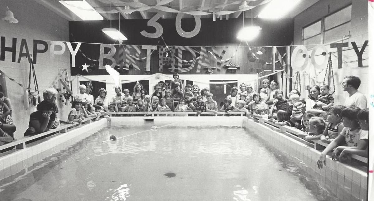 Guests wait for Snooty’s arrival to his 30 th birthday party. (1978)