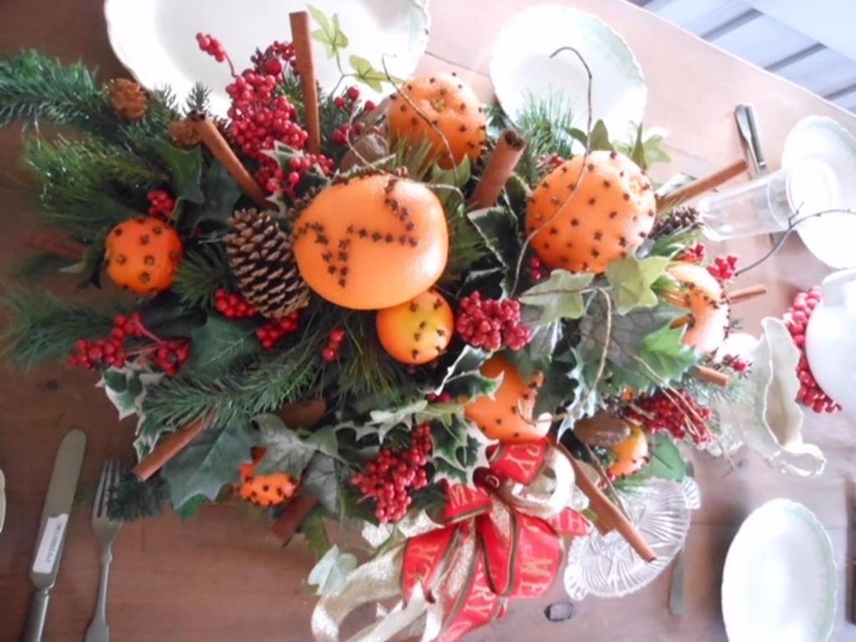 The centerpiece table decoration for the 1912 Settlers Home in Manatee Village Historical Park. The holiday decorations at Manatee Village are inspired by Victorian and Florida pioneer traditions. In the late 1800s and early 1900s, the most common decorations were fruits, nuts and other natural elements.