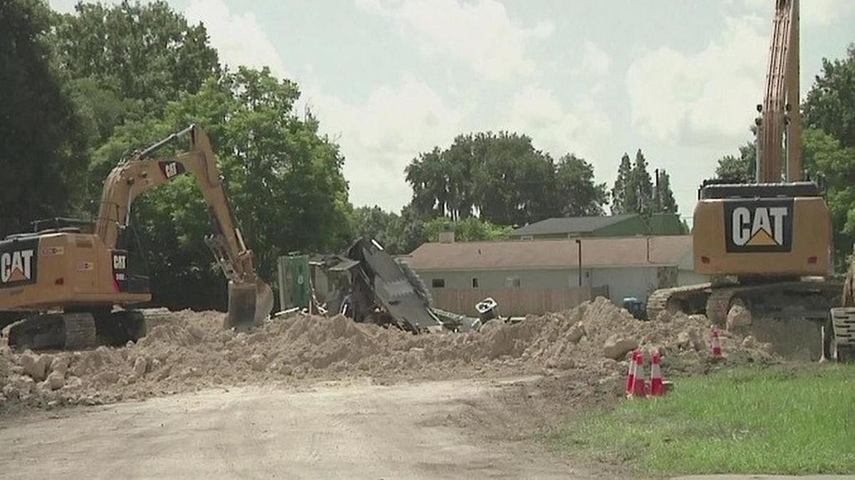 Cleanup is expected to continue Monday after two additional homes were condemned during the weekend and another on Monday on Ocean Pines Drive, where a large sinkhole opened on July 14.
