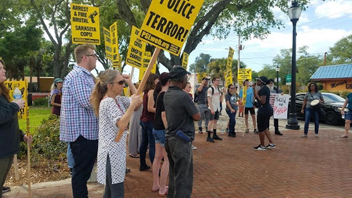 Protestors gather at Fredd Atkins Park in Newtown calling for the end racism and brutality by Sarasota Police in response to the arrest of a Bradenton man Thursday evening.