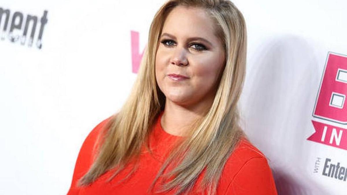 FILE - In this Nov. 15, 2015, file photo, Amy Schumer attends the VH1 Big In 2015 with Entertainment Weekly Award Show held at the Pacific Design Center in West Hollywood, Calif. Amy Schumer’s rant against Donald Trump apparently turned off some fans at her show in Tampa, Florida, Sunday, Oct. 16, 2016. The Tampa Bay Times reports a reporter counted about 200 people walked out over the comments