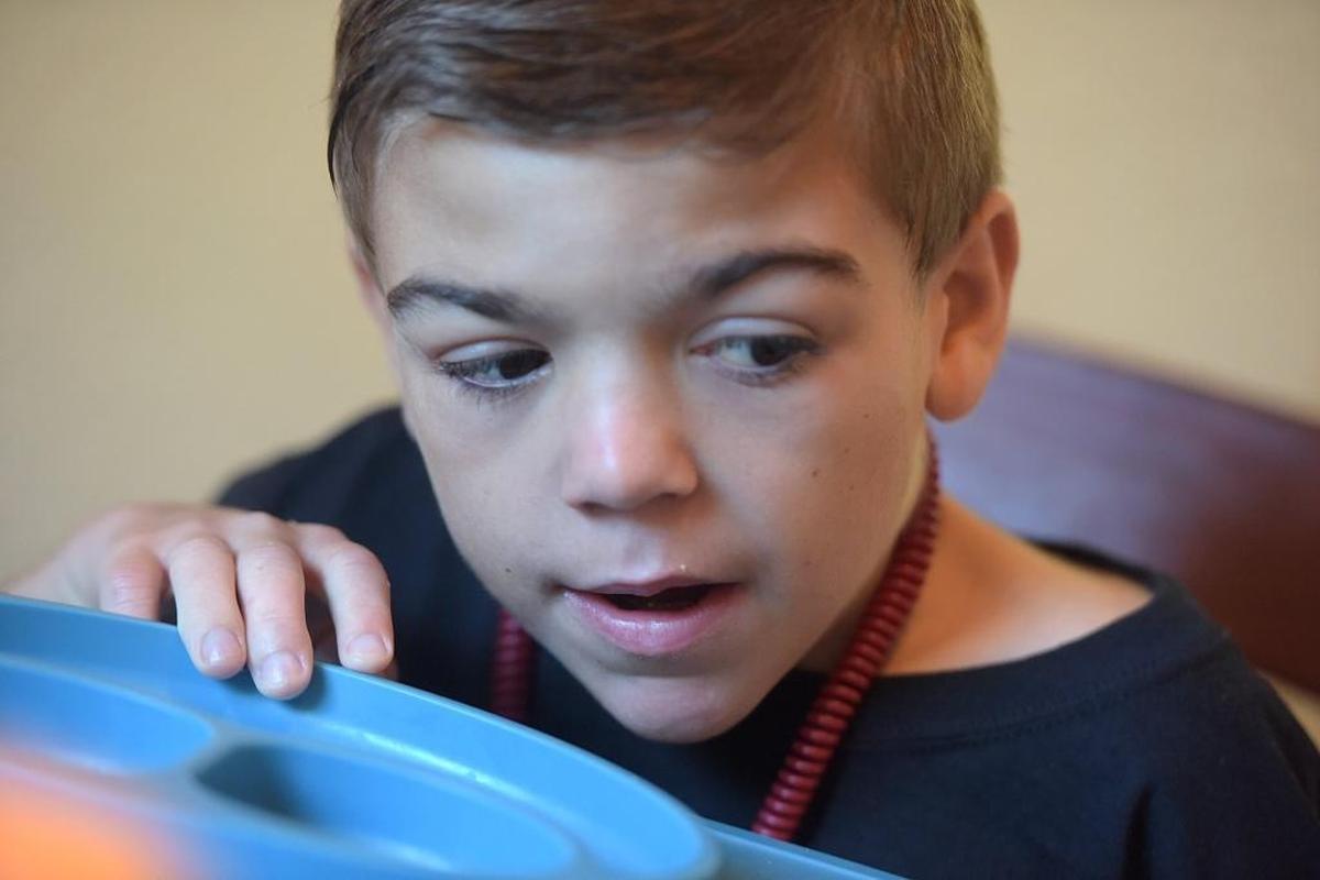 Trenton Greer, 8, was diagnosed with Sanfilippo syndrome in February, after his parents Jenny and Travis Greer noticed his steady decline. What is often misdiagnosed as autism, Sanfilippo is a childhood genetic disorder that is typically fatal, where dead cells build up around vital organs and can cause brain damage.