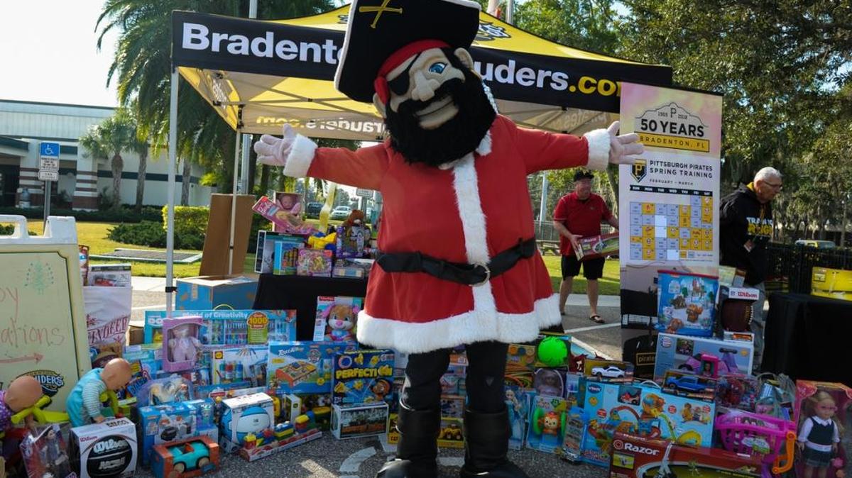 Marty the Marauder shows all the treasures he collected Saturday morning for area kids. The Bradenton Marauders held their annual Marty’s Toy Drive at Pirate City in Bradenton.