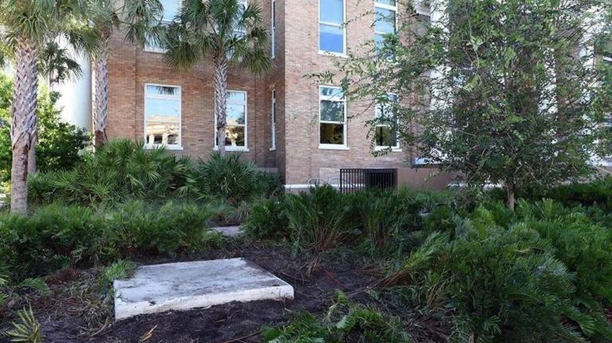 An empty slab greeted visitors to the Manatee County Courthouse where the Confederate monument previously stood. The monument has been the subject of demonstrations, both for and against its presence.
