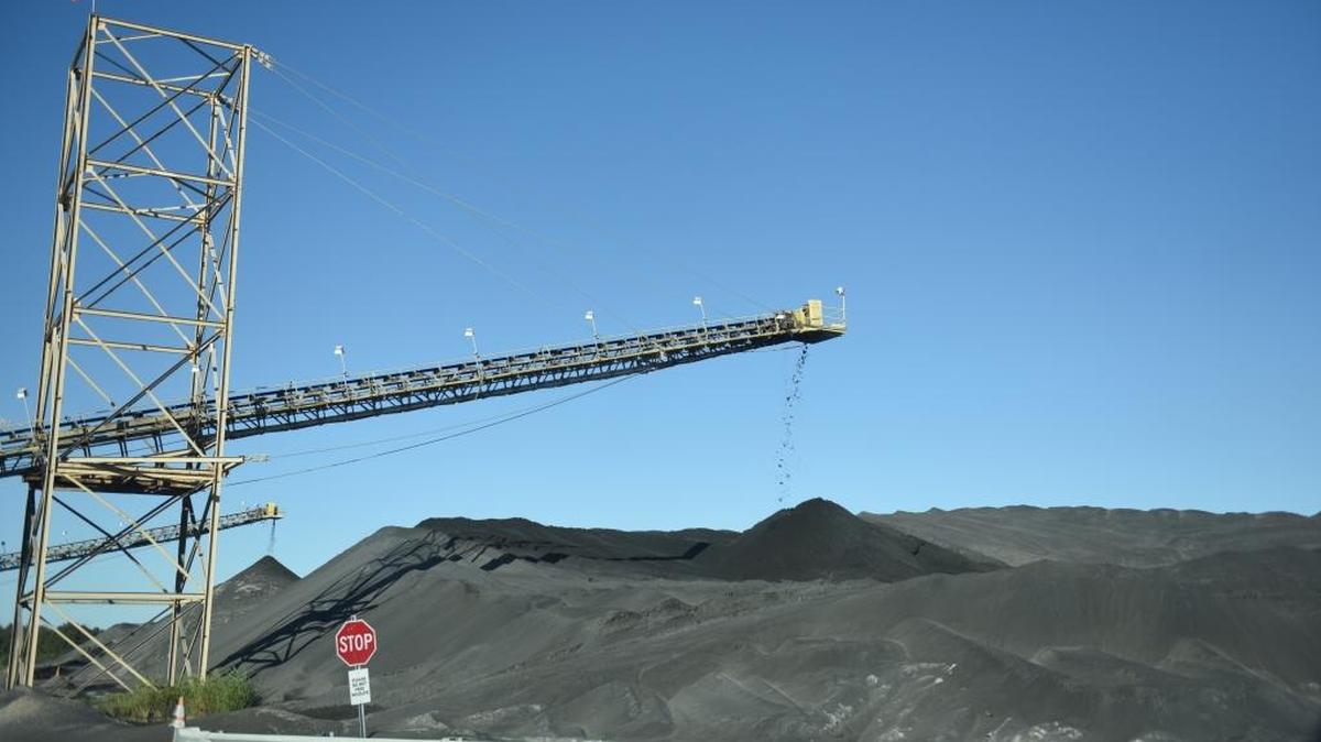 Phosphate falls from a conveyor belt after being processed at Mosaic’s Wingate Creek Mine in 2017.