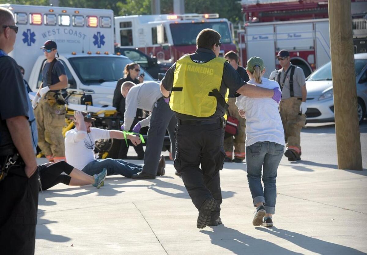 Responders evacuate volunteer casualties during Operation Inshore Slam, a full-scale exercise to test the response from local emergency responders to a multi-casualty terrorism event unfolds Wednesday at LECOM Park.