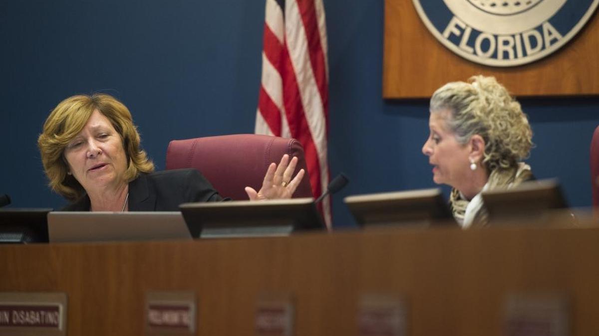 Chairman Betsy Benac and Commissioner Robin DiSabatino, District 4, argue Tuesday as Manatee County Commissioners discuss beginning a national search for a new county administrator.