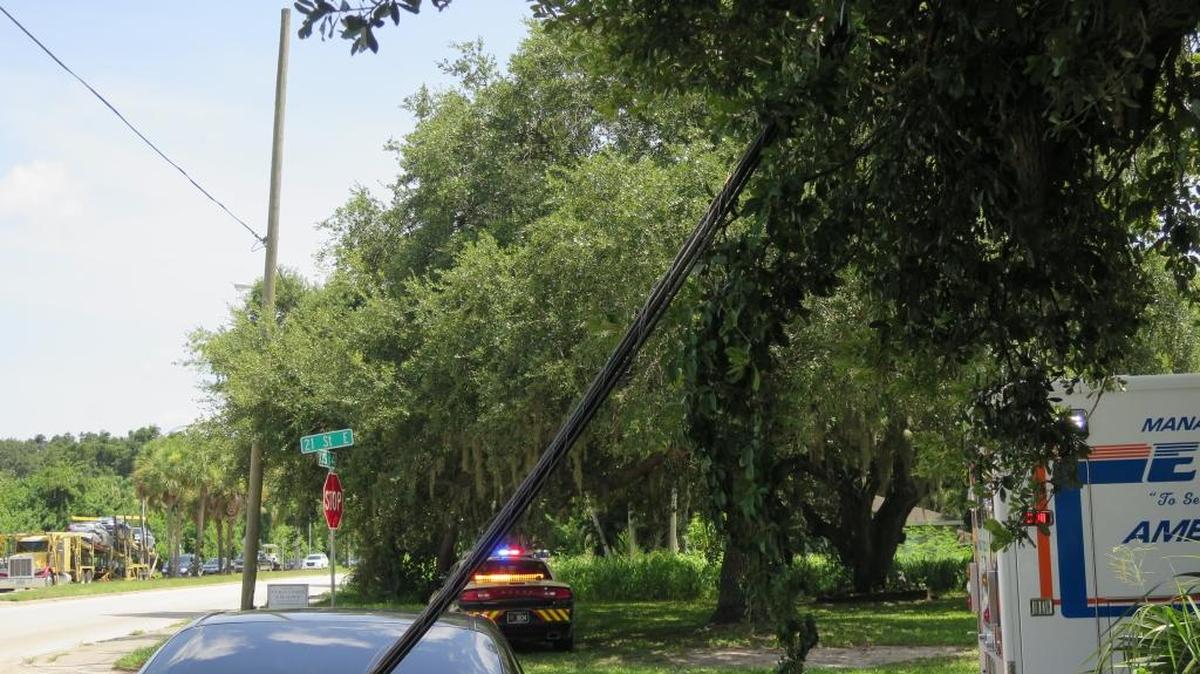 Power lines are down Thursday afternoon in Palmetto by the intersection of US 41 and 21st Street East. A Florida Highway Patrol trooper on scene said he heard from someone that a semi-truck was involved but that he had yet to determine that.