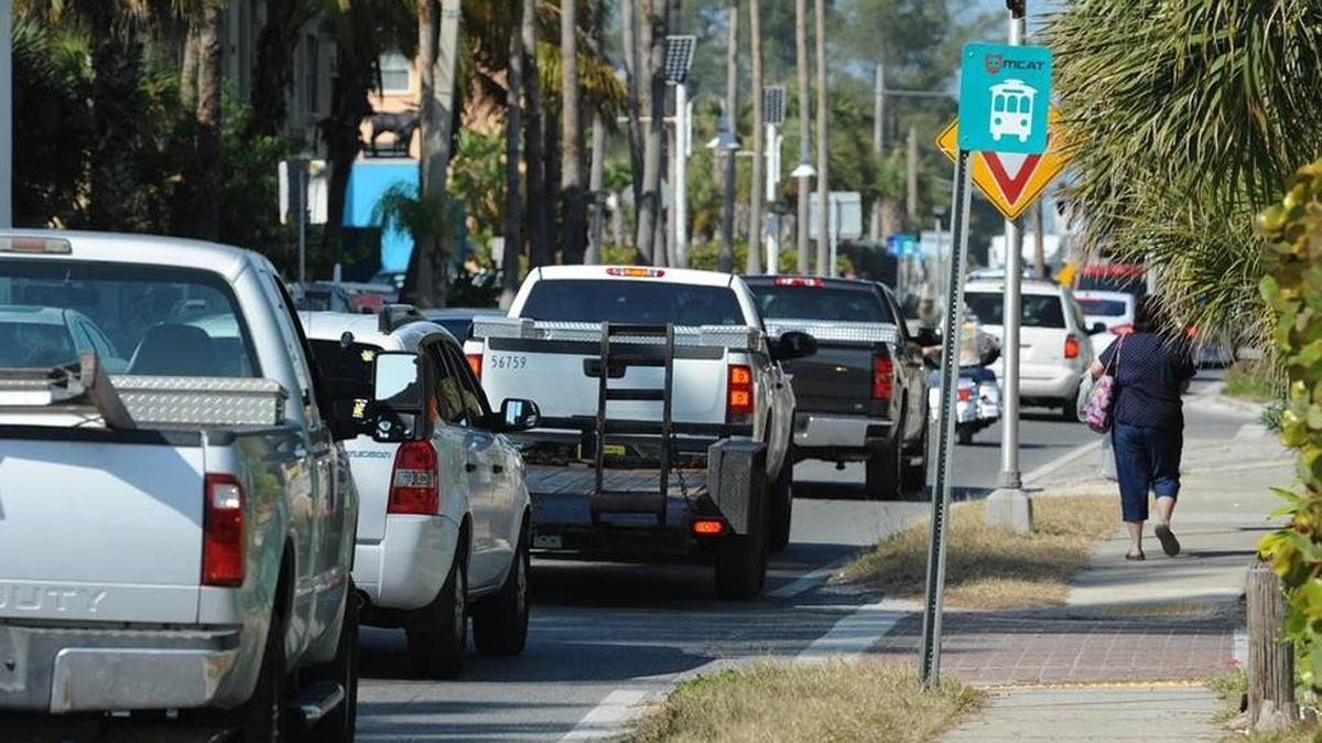Traffic moves slowly through Bradenton Beach and the heavy amount of visitors to the beach area place parking at a premium, especially in the busy tourist season, in this Herald file photo.