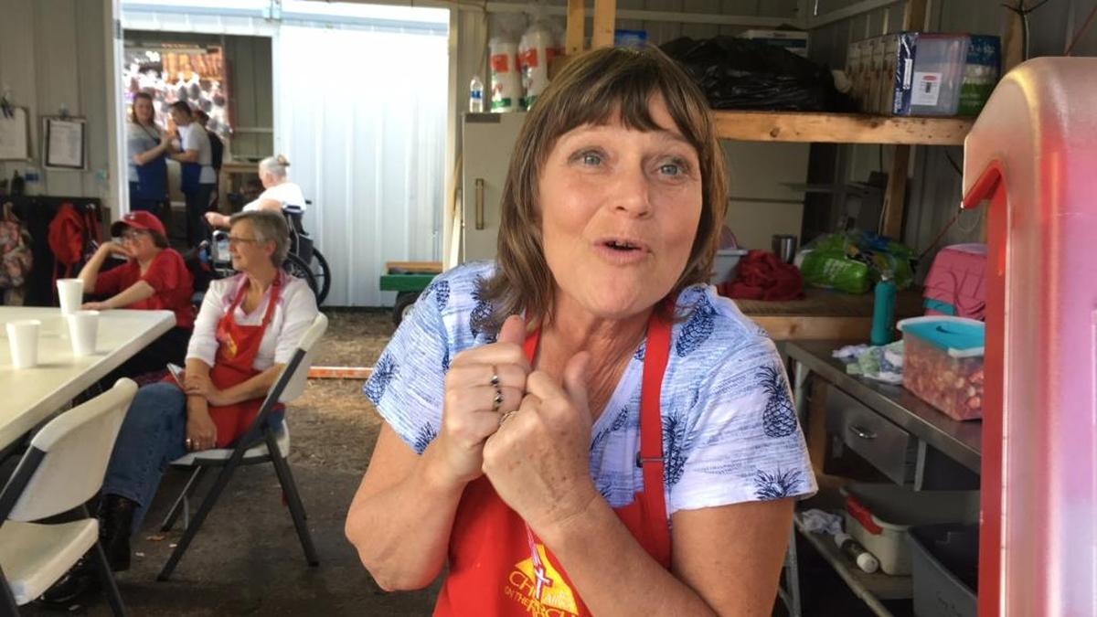 Who could resist buying a strawberry shortcake from Sheri Ketner of Church On the Rock? Few good this year as the church went through 300 flats of strawberries at its strawberry shortcake booth at the 2018 Manatee County Fair.