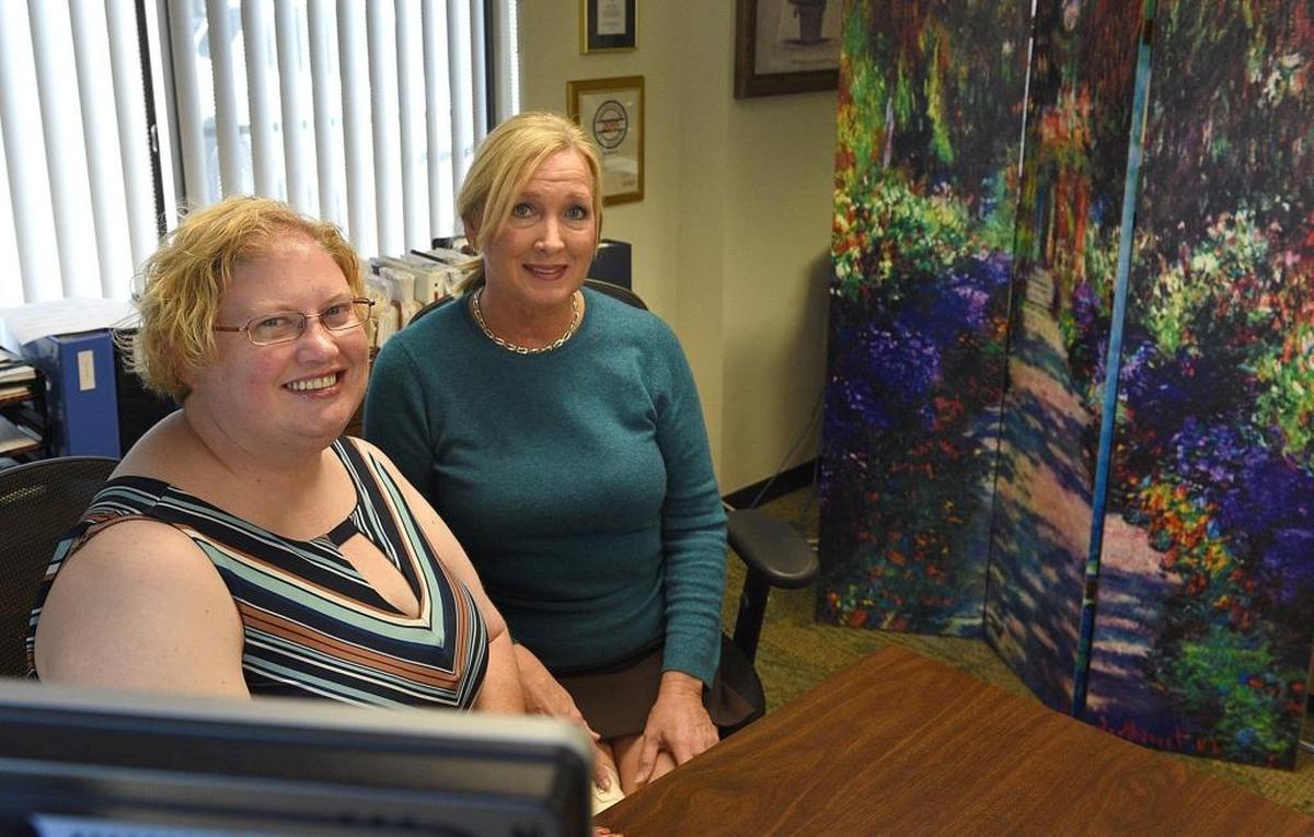 The new executive director of Keep Manatee Beautiful, Jennifer Hoffman, left, with Ingrid McClellan, who has filled that position since 1996.