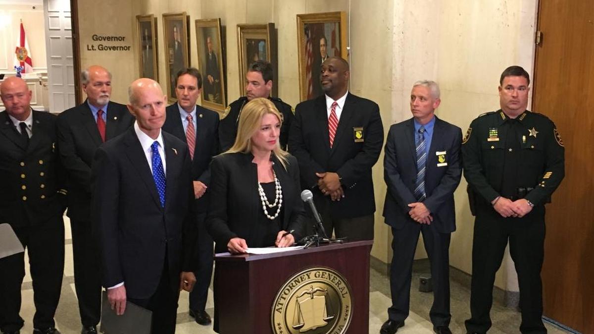 Gov. Rick Scott and Attorney General Pam Bondi announce statewide workshops and a new deal with drug companies to combat the opioid epidemic Tuesday in the Florida Capitol.