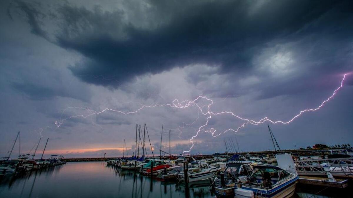 Lightning streaks across the sky over the marina Thursday, July, 21, 2006 in Port Washington, Wi.
