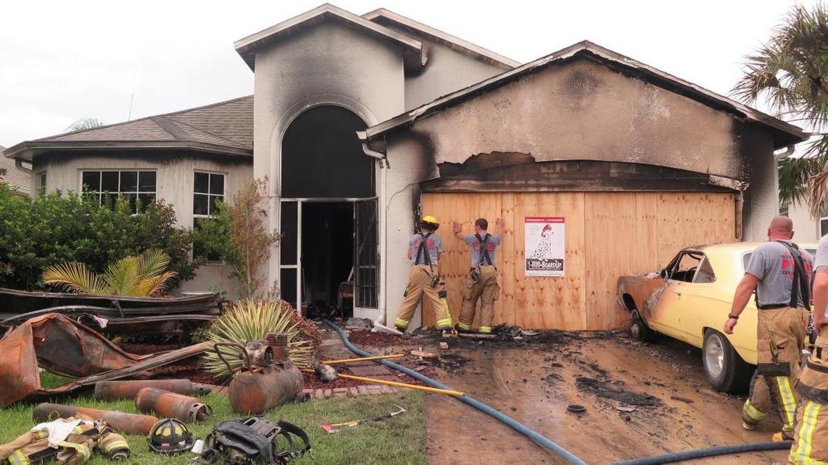 North River firefighters work on a home in the 5900 block of French Street Court in Ellenton after a fire Friday evening.