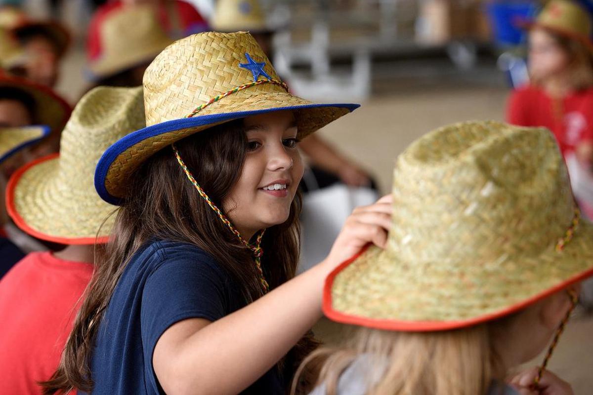 Manatee County third graders enjoy themselves at a highlight of the county’s Farm City Week, a learning experience called Ag Venture, at the fairgrounds in Palmetto.