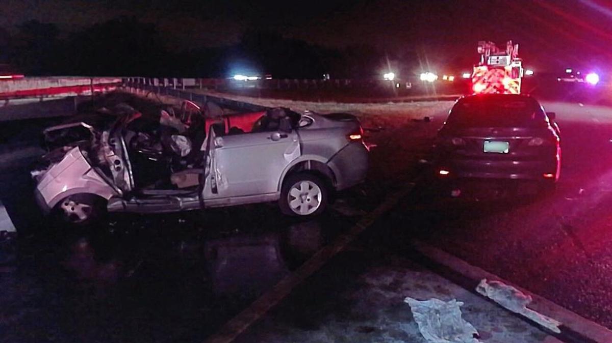 Interstate 75 in Hillsborough County south of Gibsonton Drive was closed for several hours Thursday night after a wrong-way driver crashed into another vehicle, killing three people, according to Florida Highway Patrol.